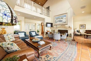 TV, fireplace, books, offices