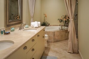 Shower, jetted tub, towels, soap