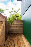Loft família, sacada, vista para o pátio | Terraço/pátio