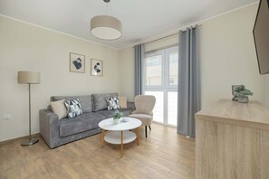 TV - Family Apartment | Parking, Balcony, Close to the Beach (Ustronie Morskie)