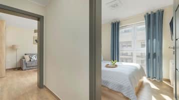 2 habitaciones, tabla de planchar con plancha, cuna de viaje y wifi