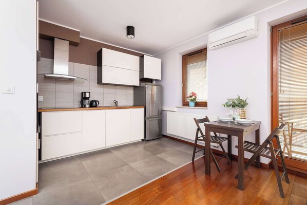 Fridge, oven, stovetop, dishwasher - Exceptional Apartment with Balcony by Noclegi Renters (Kraków)