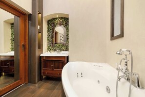 Shower, hair dryer, towels, shampoo