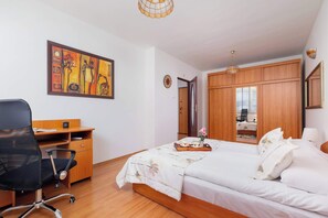 1 bedroom, desk, iron/ironing board, travel cot