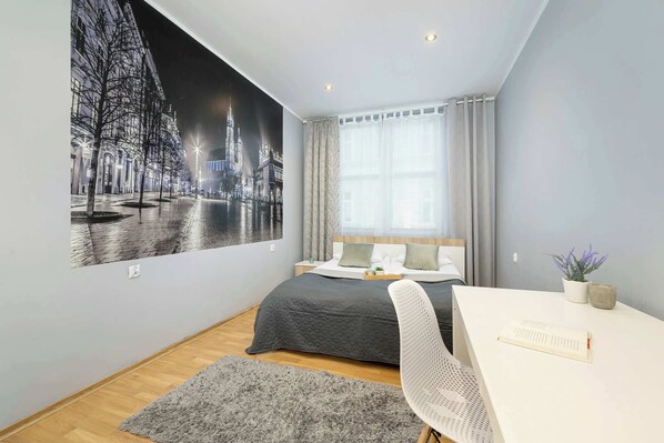 1 bedroom, desk, iron/ironing board, travel cot