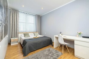 1 bedroom, desk, iron/ironing board, travel cot