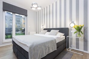 1 slaapkamer, een strijkplank/strijkijzer, reisbedje, wifi