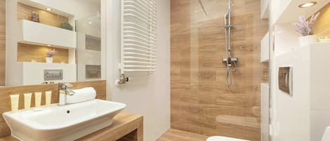 Shower, hair dryer, towels, shampoo