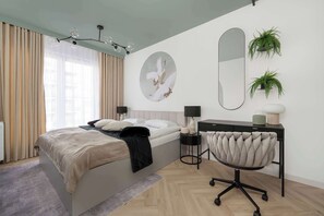 2 slaapkamers, een bureau, een strijkplank/strijkijzer, reisbedje