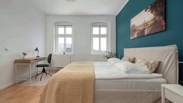 1 bedroom, desk, iron/ironing board, travel cot