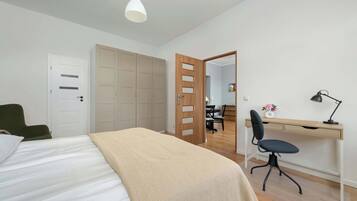 1 bedroom, desk, iron/ironing board, travel cot