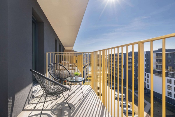 The balcony's peaceful ambiance is ideal for unwinding.
