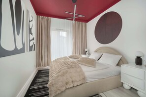 1 dormitorio, tabla de planchar con plancha, cuna de viaje y wifi
