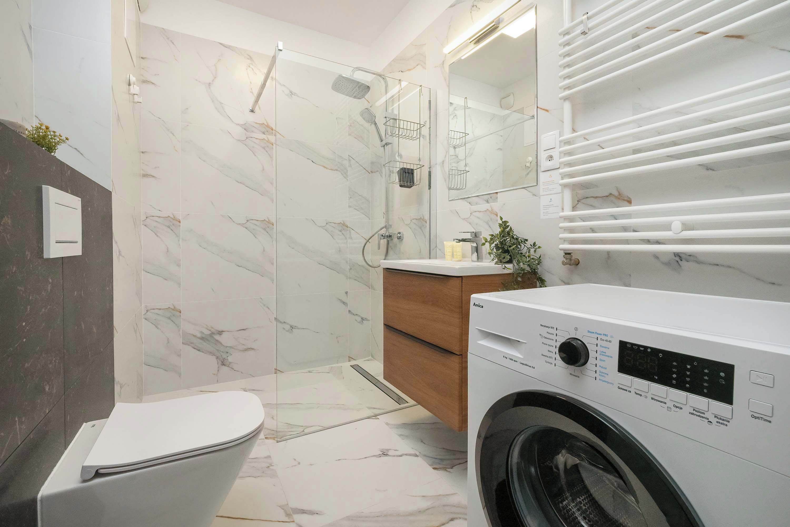 Shower, hair dryer, towels, shampoo