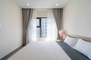 Desk, laptop workspace, blackout curtains, iron/ironing board - LA Nest 1bed+ Long stay – big deal at Vincom View! (Ho Chi Minh City)