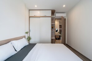 Desk, laptop workspace, blackout curtains, iron/ironing board - LA Nest 1bed+ Long stay – big deal at Vincom View! (Ho Chi Minh City)