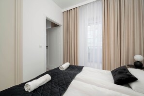 1 bedroom, desk, iron/ironing board, travel cot