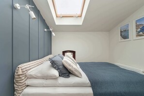 1 bedroom, desk, iron/ironing board, travel cot