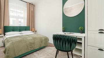 2 dormitorios, escritorio, tabla de planchar con plancha y wifi