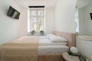 1 bedroom, desk, iron/ironing board, travel cot