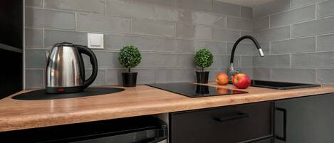 Fridge, microwave, stovetop, cookware/dishes/utensils