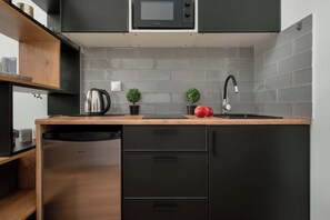 Fridge, microwave, stovetop, cookware/dishes/utensils