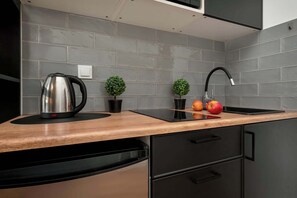 Fridge, microwave, stovetop, cookware/dishes/utensils