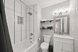 Shower, hair dryer, shampoo