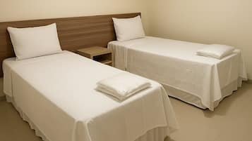 Standard Twin Room | In-room safe, desk, laptop workspace, blackout drapes