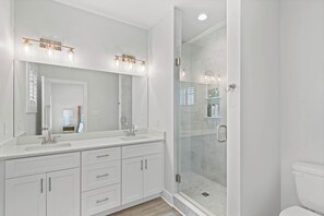 Shower, towels, shampoo, toilet paper