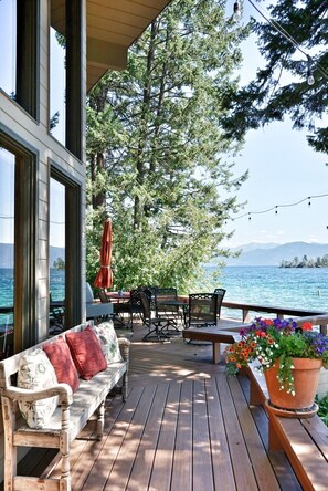 Terrace/patio - Flathead lakefront Charming 3-bedroom house with deck overlooking two islands! (Rollins)