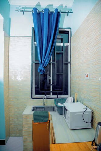 Cozy home|City center|5 Min to Shoppers Plaza|Near Parliament| 10 Min to Airport