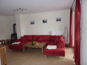 TV, fireplace, books - Ferienhaus Nemo Wohnung 4 "Marlin" (Rerik)