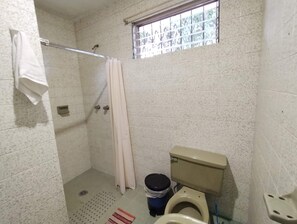 Shower, towels, soap, toilet paper