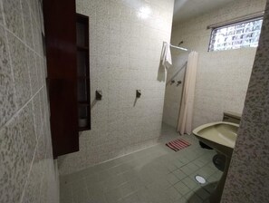 Shower, towels, soap, toilet paper