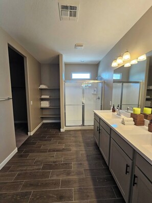 Shower, hair dryer, towels, soap