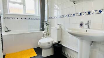 Hair dryer, towels, soap, shampoo