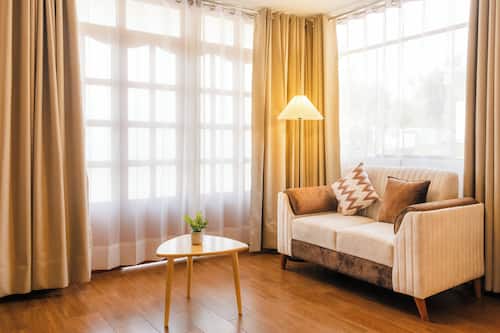 Junior Studio Suite | Living area | 45-inch flat-screen TV with digital channels