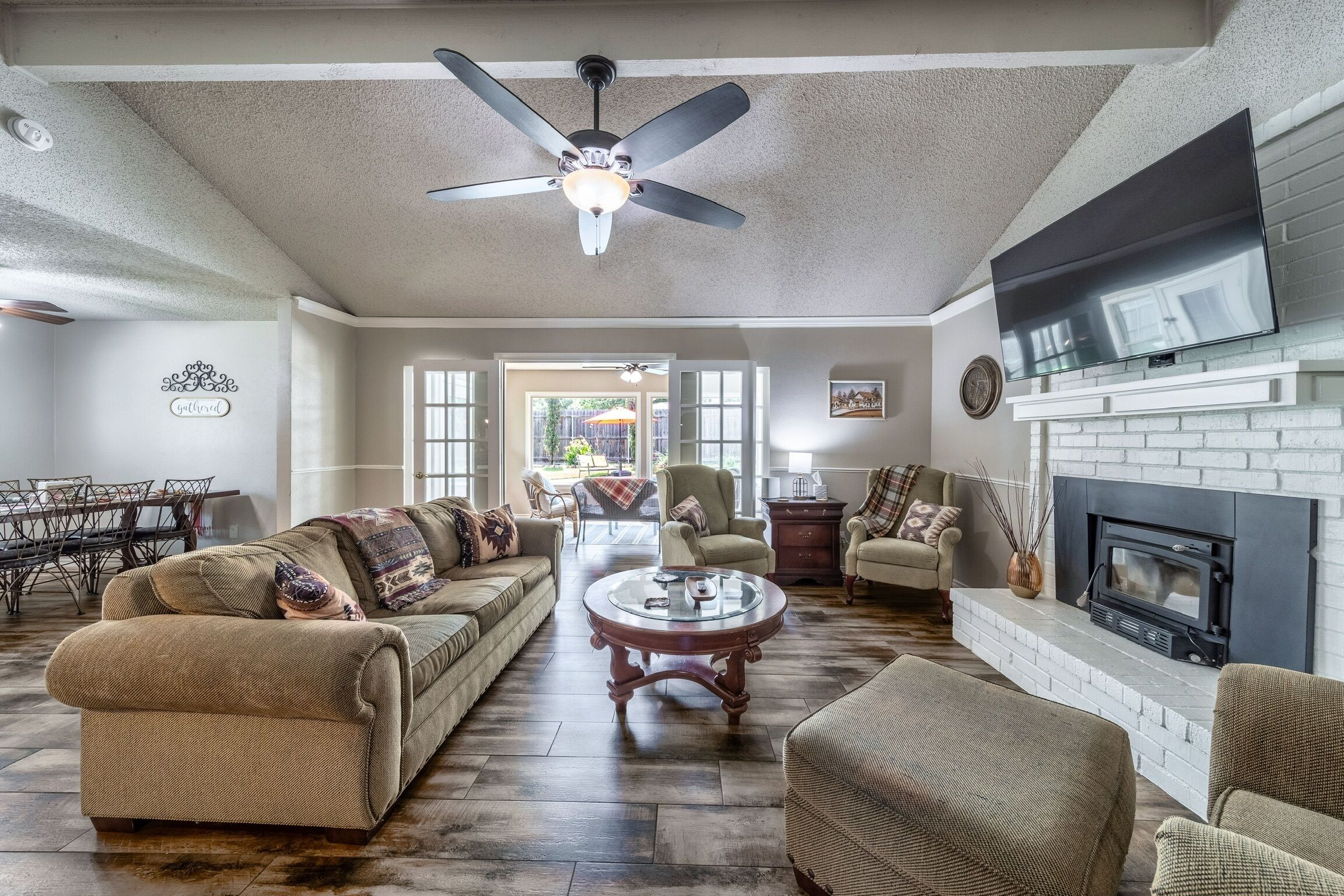 Smart TV, fireplace, books