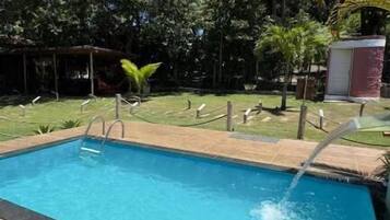 Indoor pool, pool umbrellas, sun loungers