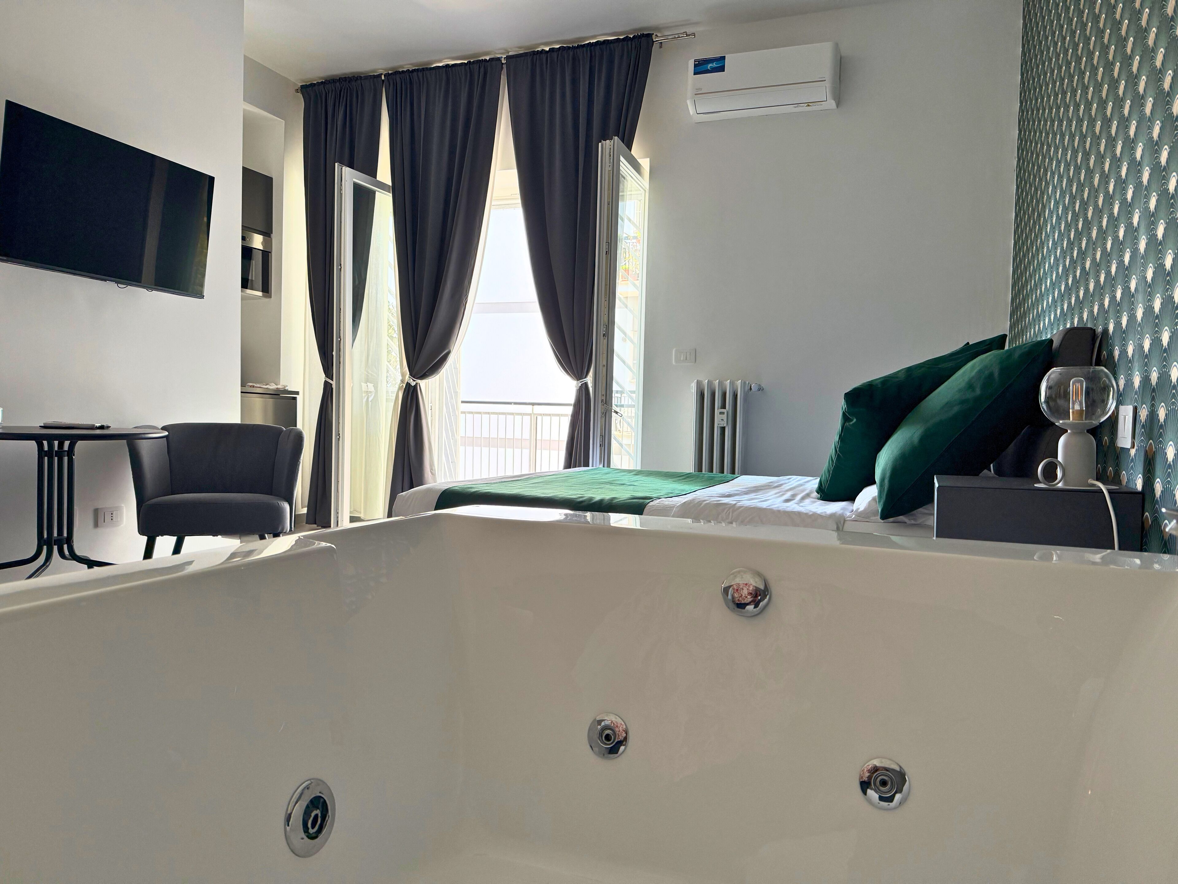 Luxury Double Room, Balcony, Courtyard View | Minibar, laptop workspace, blackout curtains, soundproofing