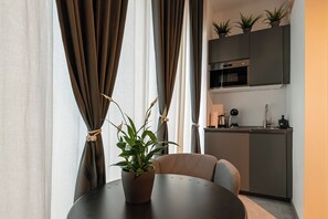 Deluxe Double Room, Balcony, Courtyard View | Laptop workspace, blackout drapes, soundproofing, free WiFi