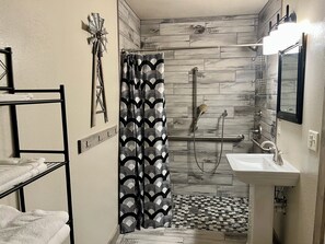 Shower, hair dryer, towels, soap