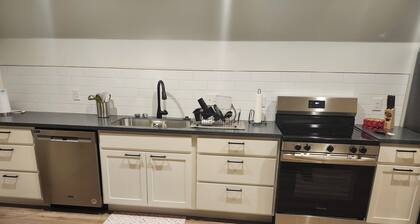 Brand new studio apartment with queen bed, queen pull out, WIFI and AC .