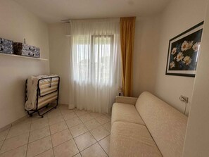 TV - Holiday apartment mit Klimaanlage und Balkon (San Michele al Tagliamento)