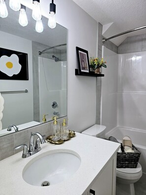 Hair dryer, towels, soap, toilet paper