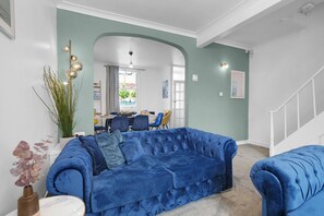 Family House, Patio | Living area | 42-inch Smart TV with satellite channels, Netflix, streaming services - Charming 3 Bed House at Blakes Cottages (Reading)