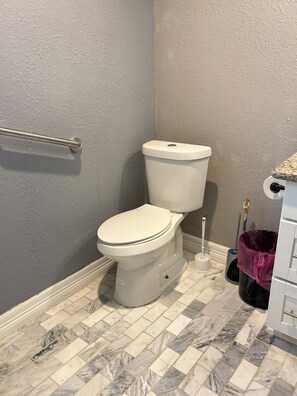 Shower, towels, soap, toilet paper