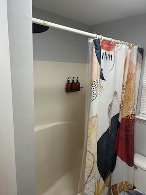 Shower, towels, soap, toilet paper