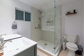 Shower, hair dryer, shampoo